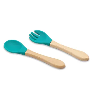 Baby silicone spoon and fork set with wooden handle, safe infant feeding tableware.