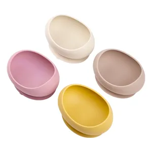 Silicone baby suction bowl detail showing multiple color options for toddler self-feeding training.