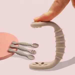 Baby silicone training spoon infant feeding double head soft teether spoon food supplement tool.