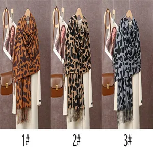 Leopard print imitation cashmere tassel scarf detail showing three stylish color variants clearly.