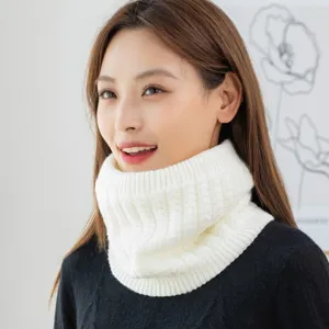 Detail shot of white cable knit fleece lined neck warmer showcasing soft texture and warm fit.