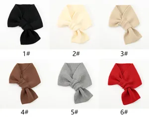 Women winter warm knitted bow scarf short versatile retro cross neckerchief variant view.