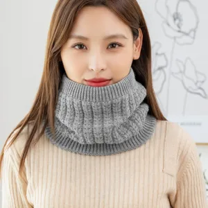 Grey knitted neck warmer detail close-up, thick warm fleece lined snood scarf for winter daily wear.