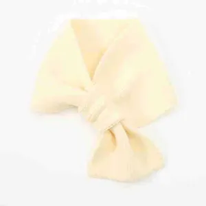 Knit small scarf bow neck warmer short winter cozy fashion accessory detail view.