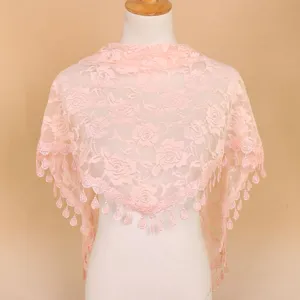 Pink lace triangular scarf with floral pattern and tassel drop for women fashion accessory detail.