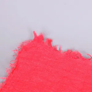 Solid color cotton scarf main view showcasing the natural wrinkled fringe edge in bright pink.