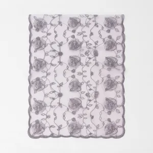 Close-up of elegant grey rose lace embroidered mesh shawl detail texture fabric showcase