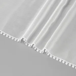 White sheer gauze scarf detail with delicate floral lace trim, lightweight elegant drape shawl.