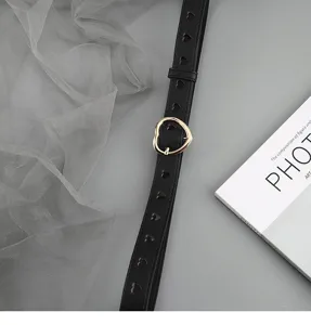 Black leather women's belt featuring cute heart cutouts and a stylish gold heart buckle.