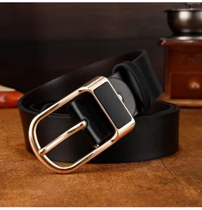 Detailed view of men's black leather belt with gold metal pin buckle, casual stylish accessory.