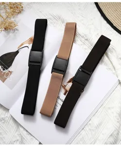 Detail shot of elastic stretch waist belts with plastic buckle in three versatile colors.