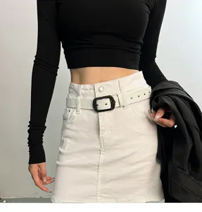 Stylish white waist belt with black pin buckle, perfect casual accessory for jeans and skirts.
