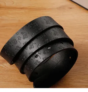 Black embossed butterfly belt detailed view, stylish casual waist accessory for jeans.