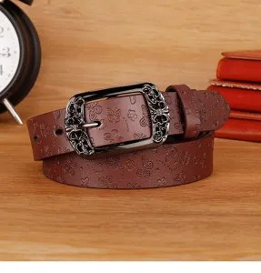 Vintage brown leather belt for women with intricate metal buckle, stylish casual waist strap.