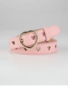 Pink heart cutout belt detail, faux leather strap with gold heart buckle close-up view.