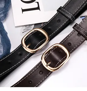 Women leather belt set black brown metal buckle contrast stitching fashion detail shot