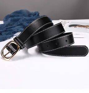 Women black leather belt with golden oval buckle and white contrast stitching detail.