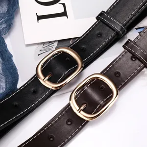 Women's fashion leather belt set with gold-colored oval buckle and contrast stitching stylish daily wear.