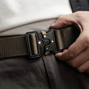 Close-up detail of the durable tactical quick-release belt buckle and heavy duty canvas strap.