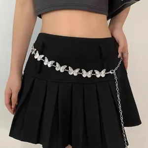Delicate silver butterfly waist chain detail, bohemian metal belt accessory for women.