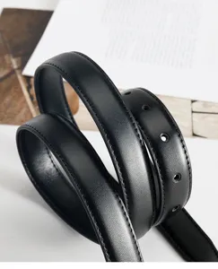 Classic black women's leather belt with neat stitching and punch holes for daily minimalist wear.