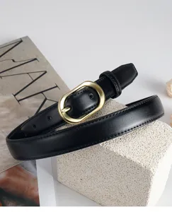 Classic black leather women belt featuring a stylish gold-tone oval metal buckle detail view.