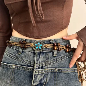 Bohemian vintage braided waist chain with wood beads and turquoise flower metal buckle.