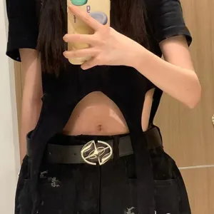 Retro black belt with statement metal buckle, edgy waist accessory for stylish outfits.