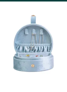 Portable velvet jewelry box for travel, round organizer case with necklace hooks and ring rolls.