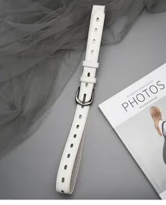 Women white cutout leather belt for jeans, vintage stylish decorative waist belt.