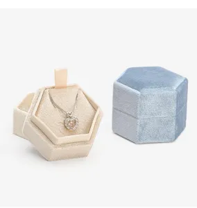 Hexagonal velvet necklace gift box with elegant jewelry storage design for travel.