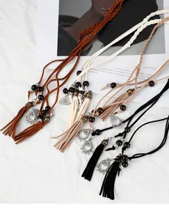 Ceinture tressée bohème avec glands et perles en bois, accessoire décoratif ethnique vintage pour robe.