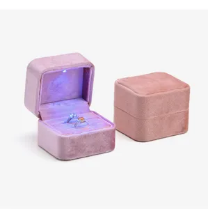 Pink velvet square ring box with built-in LED light for luxury jewelry storage and display