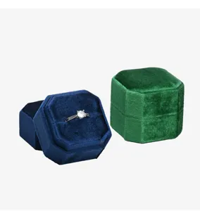 Velvet ring box detail showing octagonal velvet texture and dual-color display setup.