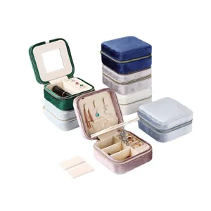 Portable velvet jewelry box with zipper, mini travel ring necklace storage organizer case.