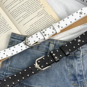 Y2K punk style studded double grommet leather belt with star details for cool girls fashion