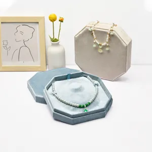 Luxury velvet octagonal jewelry box for necklaces, elegant storage display case in dual colors.