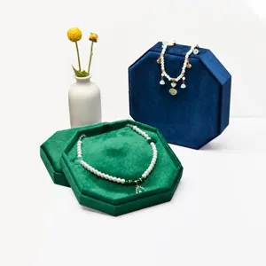 Luxurious velvet octagonal jewelry box for necklaces, elegant display storage case for pendants.