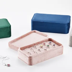 Velvet ring jewelry box organizer, portable multi-color display case for small accessories.