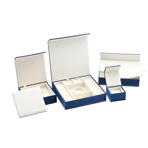 Blue velvet jewelry box organizer set with multi-functional compartments for rings and necklaces.