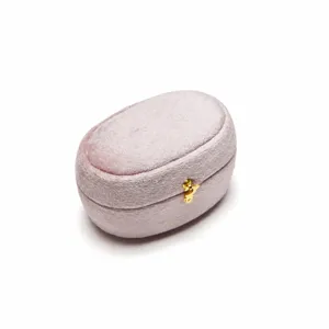 Elegant velvet ring box oval jewelry storage box gift packaging with gold metal clasp in pink