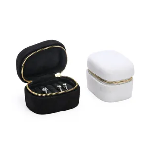Portable velvet ring box jewelry storage organizer for small earrings and rings display.