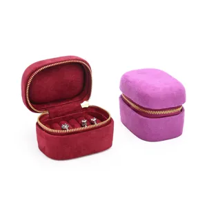 Portable velvet ring storage box set with zipper closure for jewelry display and travel.