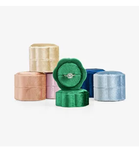 Velvet ring box detail featuring soft multi-color petal design for elegant proposal display.