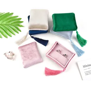 Velvet ring box with tassel portable jewelry storage box for rings and small accessories.