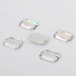 Close-up detail of rectangular double-hole flat acrylic rhinestones for DIY crafts and apparel.