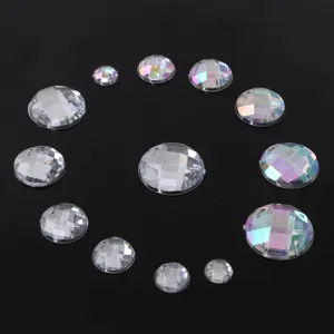 Close-up detail of round faceted acrylic sew-on rhinestones with double holes for DIY crafts.