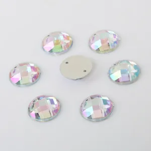 Round flatback acrylic rhinestones with holes, perfect for DIY sewing and clothing accessories.