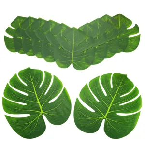 Feuilles de monstera artificielles détail, décorations de plantes vertes pour la maison.