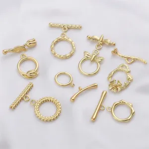 Detailed display of various assorted 18K gold plated OT clasps for DIY jewelry crafting.